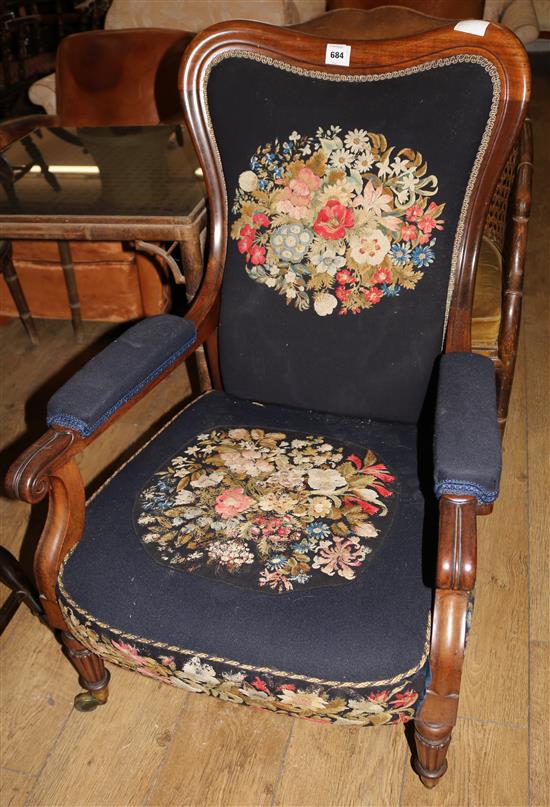 A Victorian embroidered upholstered elbow chair